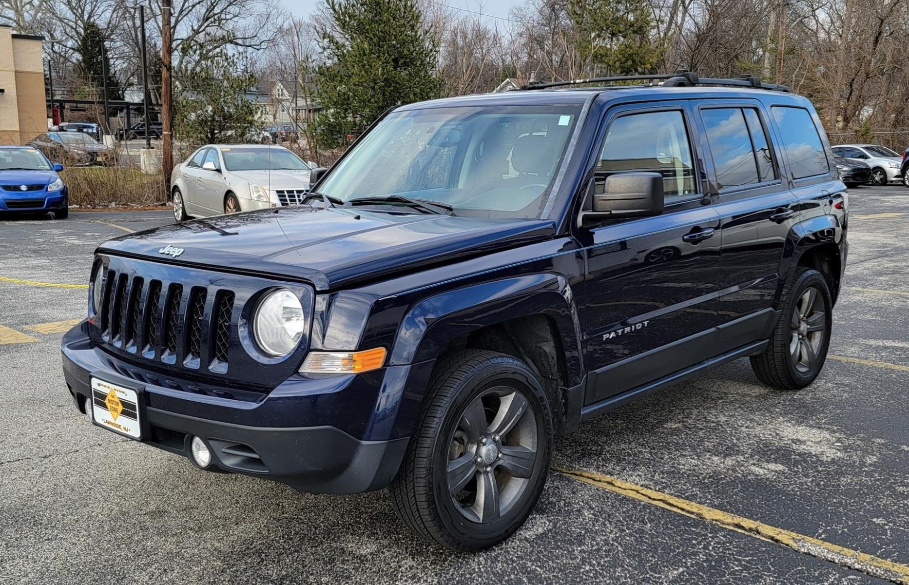 2015 Blue /Black Jeep Patriot Latitude (1C4NJRFB0FD) with an 4-Cyl, 2.4 Liter engine, Automatic transmission, located at 341 N White Horse Pike, Lawnside, NJ, 08045, (856) 262-9500, 39.855621, -75.027451 - Photo #1
